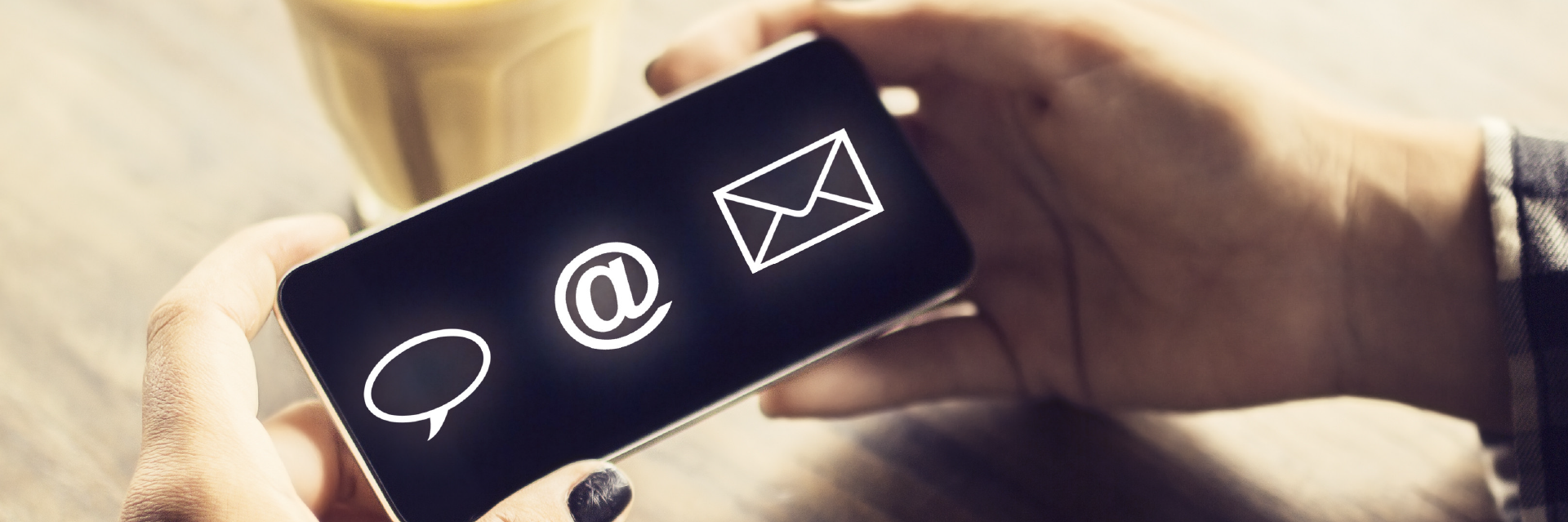 A client using their device to reach us by phone or email.