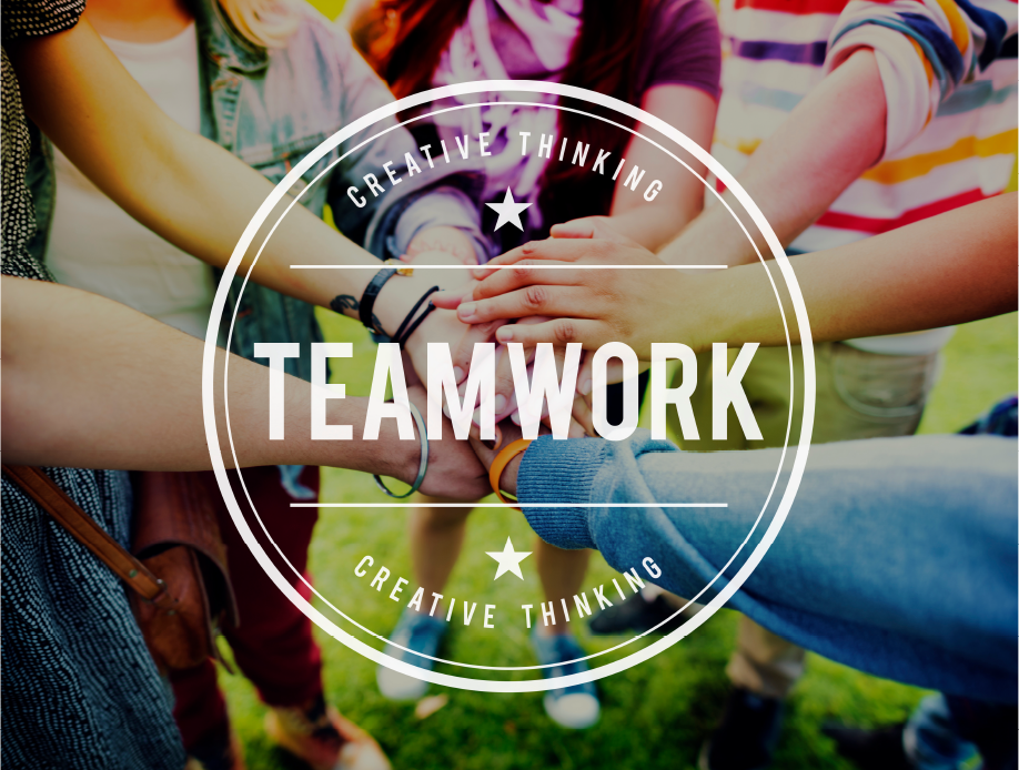 Graphic of a team of people putting their hands together in unity to represent the King and I Learn's Teamwork advantage.